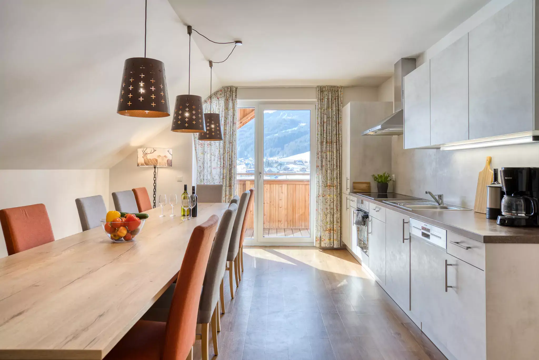 Kitchen of the apartment Skypine in the COOEE alpin Hotel Dachstein in Gosau.